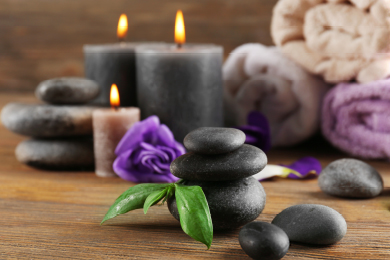 rocks, candles, and flowers