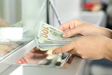counting money at a bank