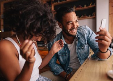 Two people having fun and laughing